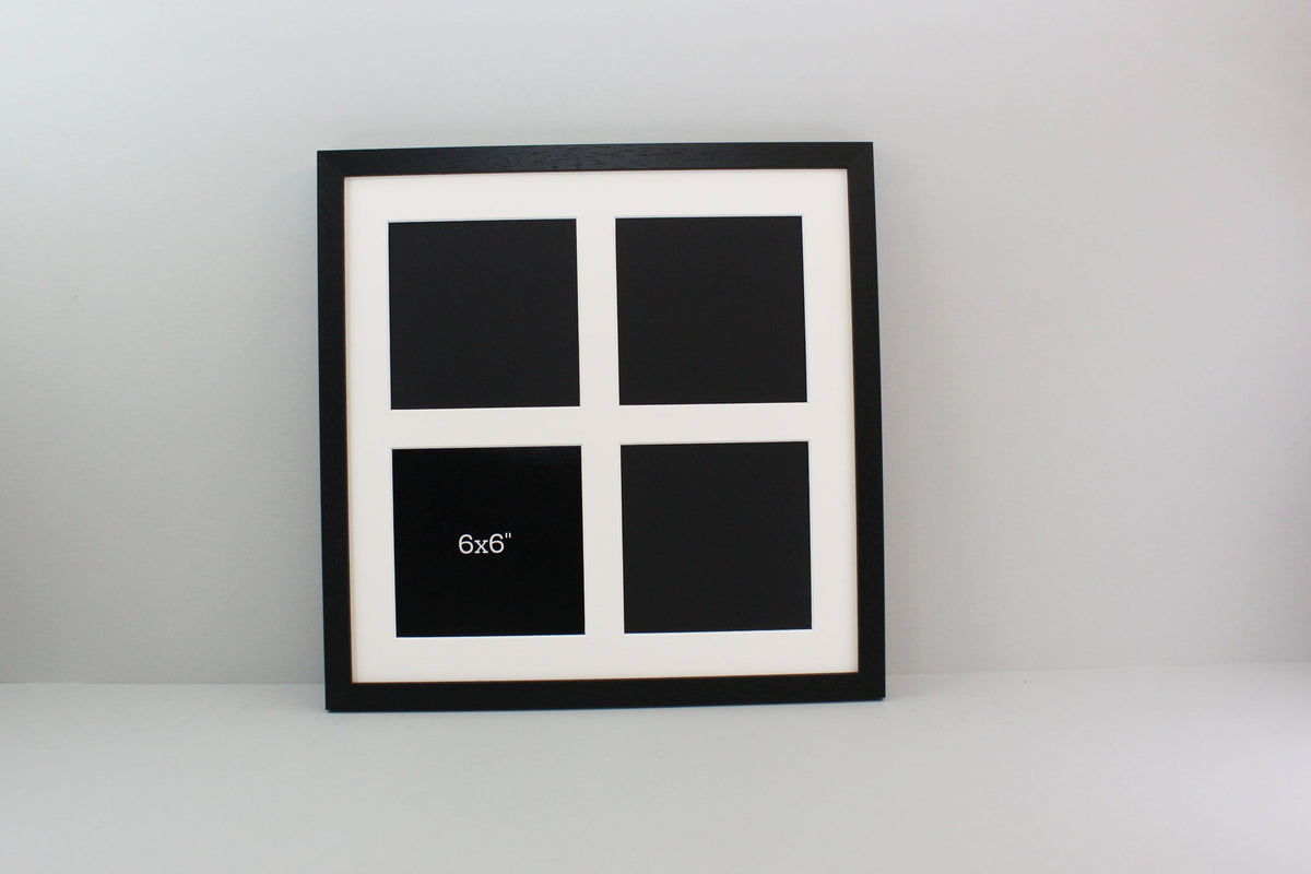 a black and white picture frame with four squares